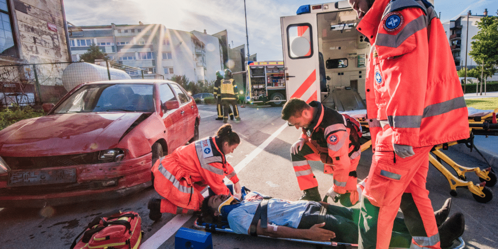 Car accident emergency team carrying a man that had concussion