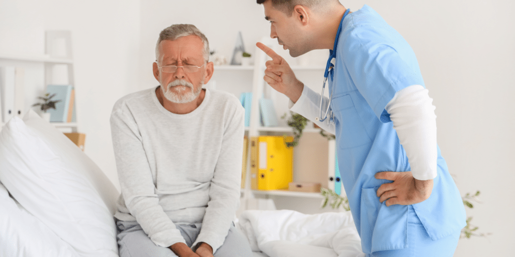 A nurse harassing an elderly man at a nursing home center